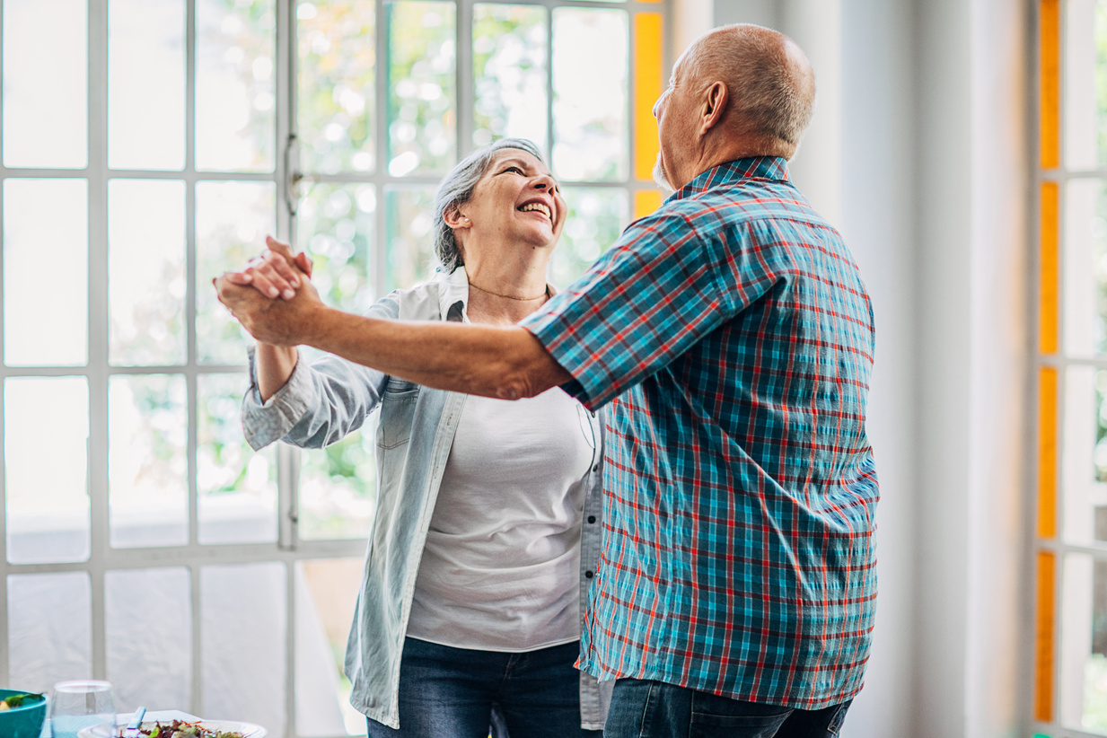 Happy old couple dancing